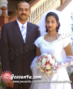 Manjesh Priya Marriage Photos at St Thomas Cathedral Pala